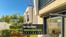 Krischer EXCLUSIVE. Neuss-Norf: Exklusive Doppelhaush�lfte mit idyllischem Garten